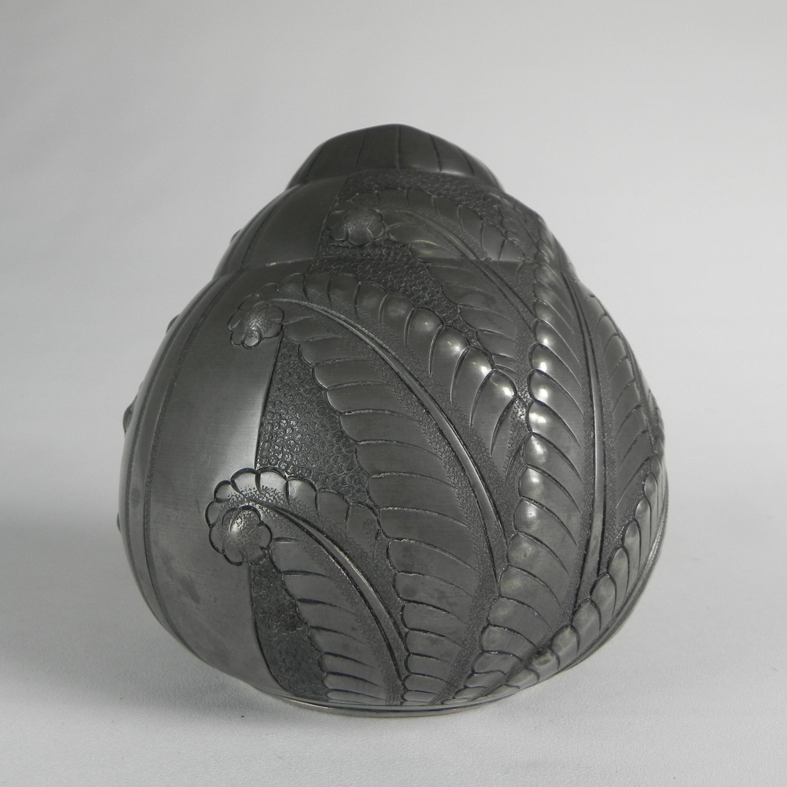 Art Nouveau pewter vase, signed PETIZON, early 20th century.