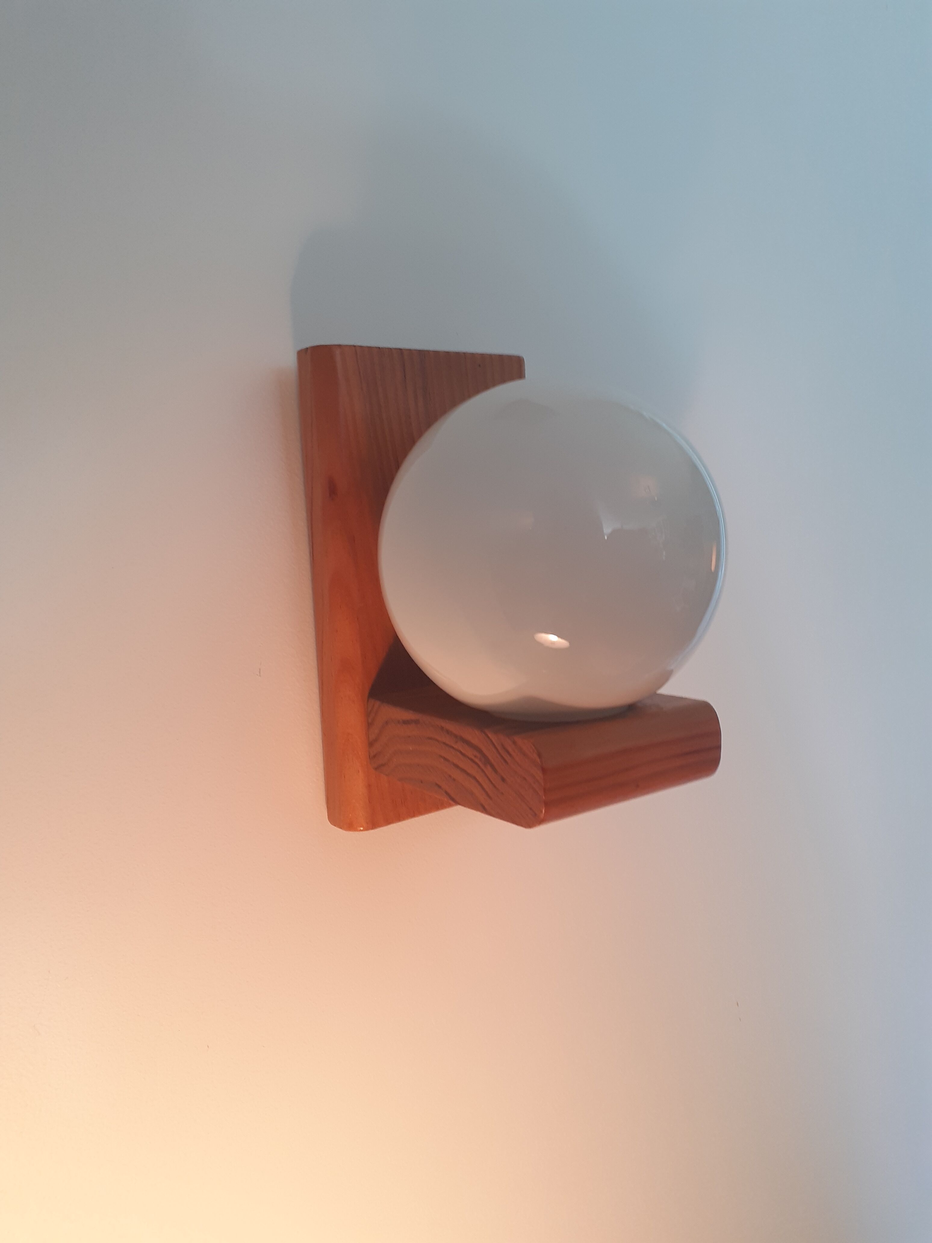 Pair of sconces in solid pine and white opaline
