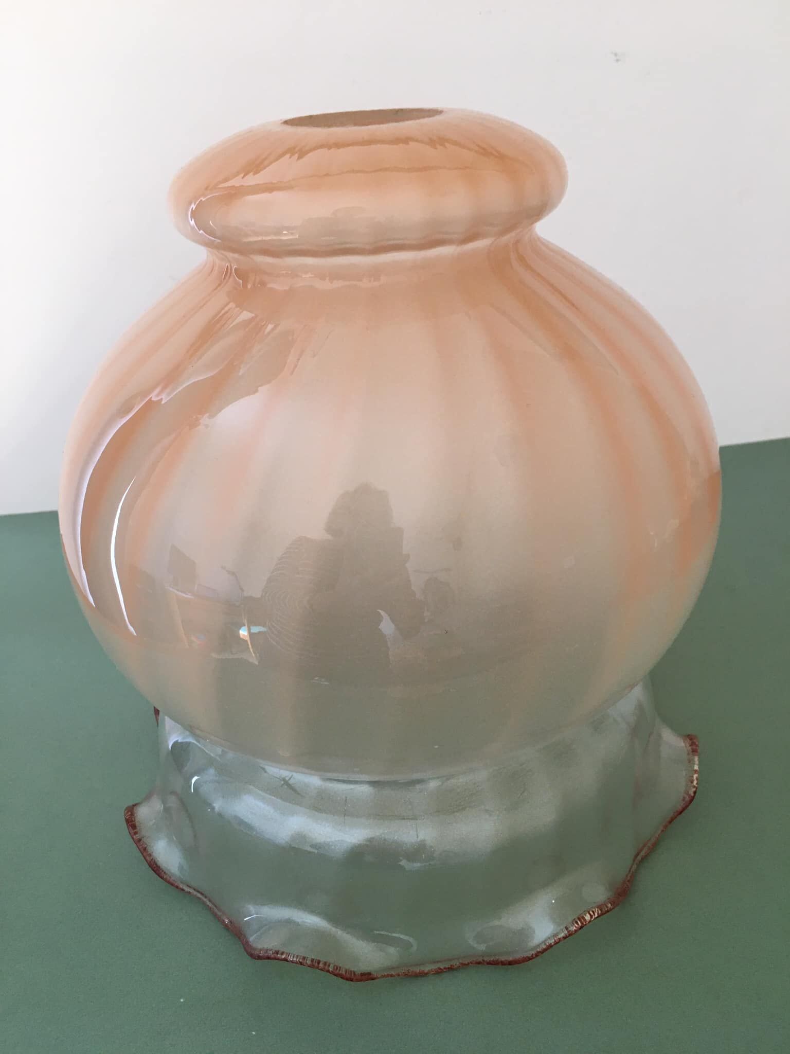 Peach-colored transparent glass collar globe