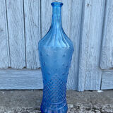 Blue glass decanter with a moon star motif