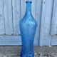 Blue glass decanter with a moon star motif