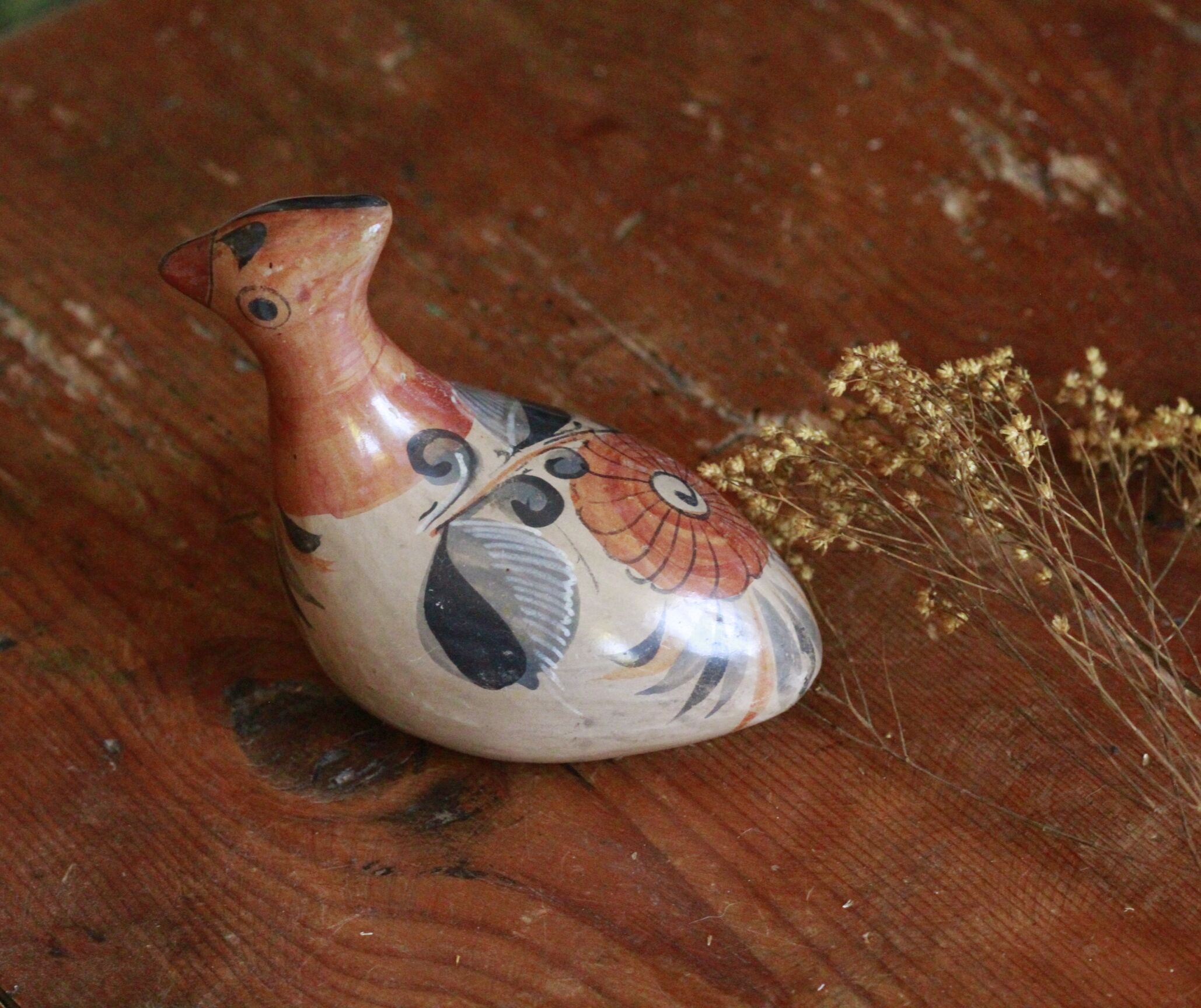 Ancient Mexican bird statue in ceramic
