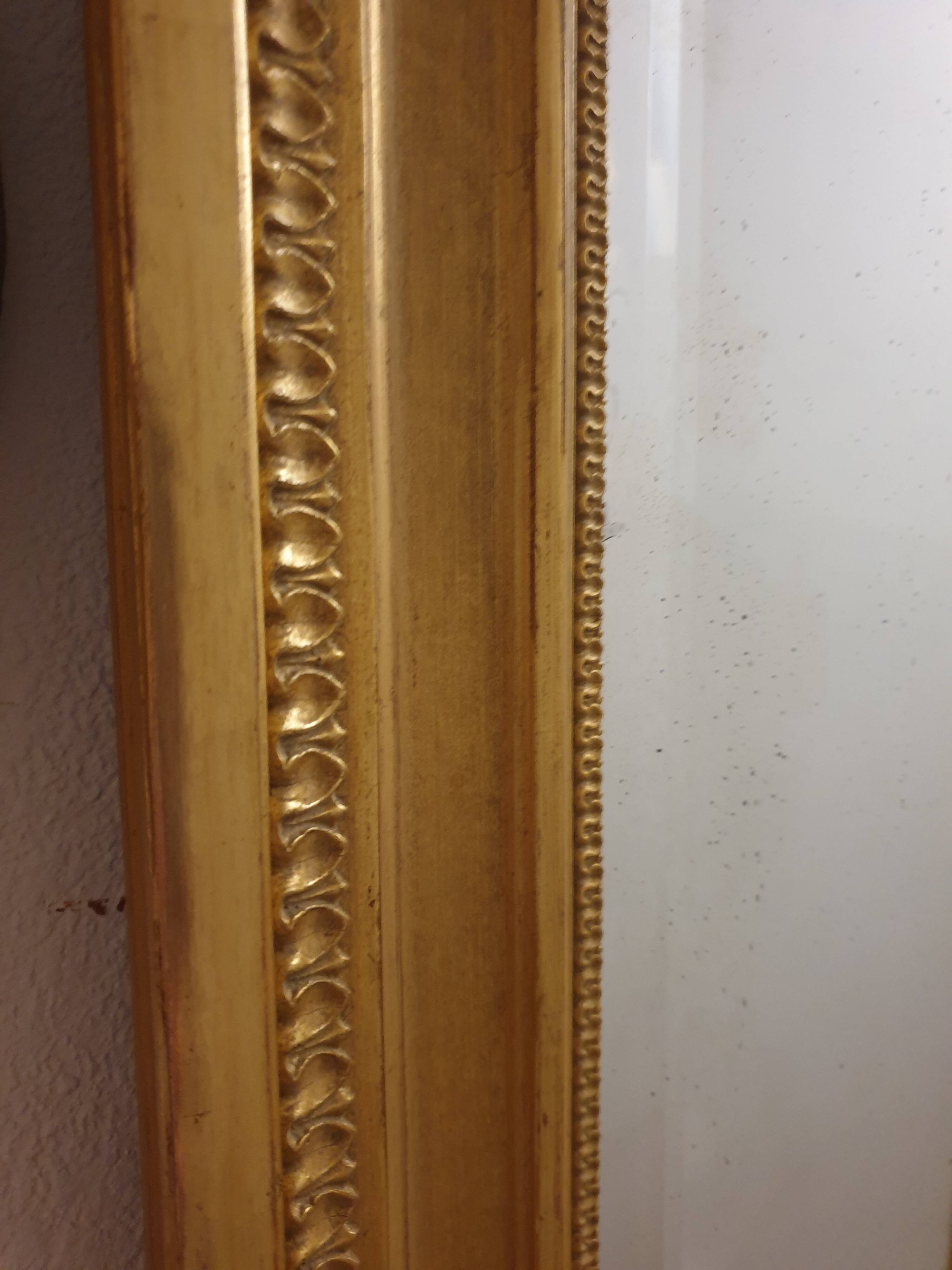 Large bevelled gold mirror