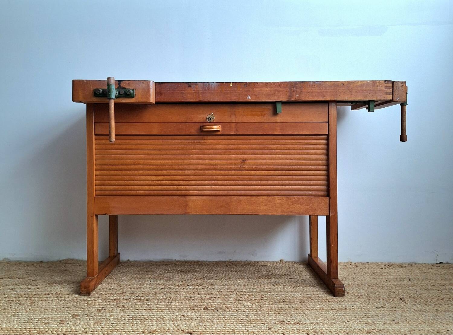 Vintage workbench with vices, antique workshop furniture.
