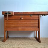 Vintage workbench with vices, antique workshop furniture.