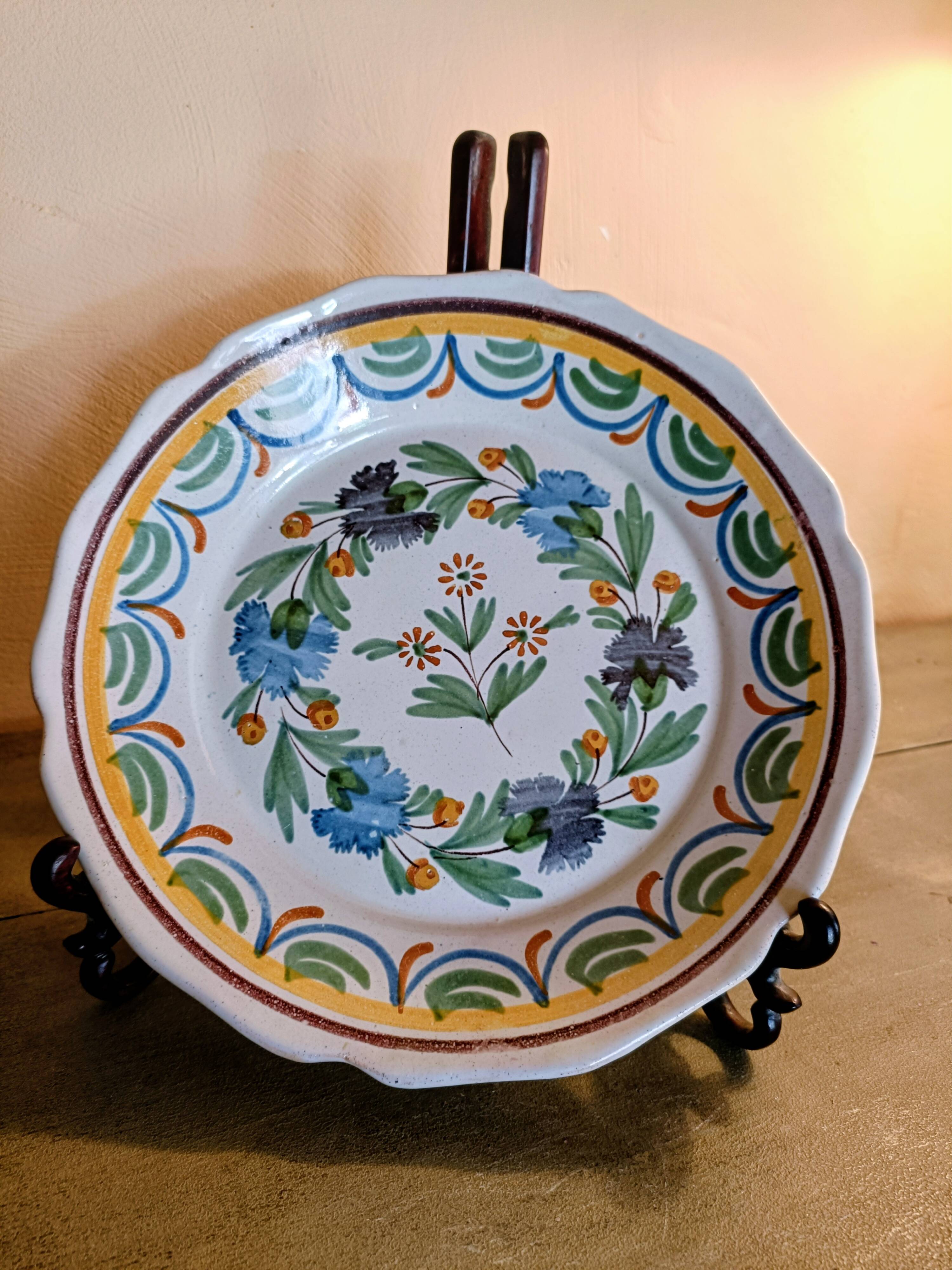 Antique hollow plate from Nevers pottery.