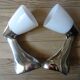 Pair of stainless steel and opaline wall lamps