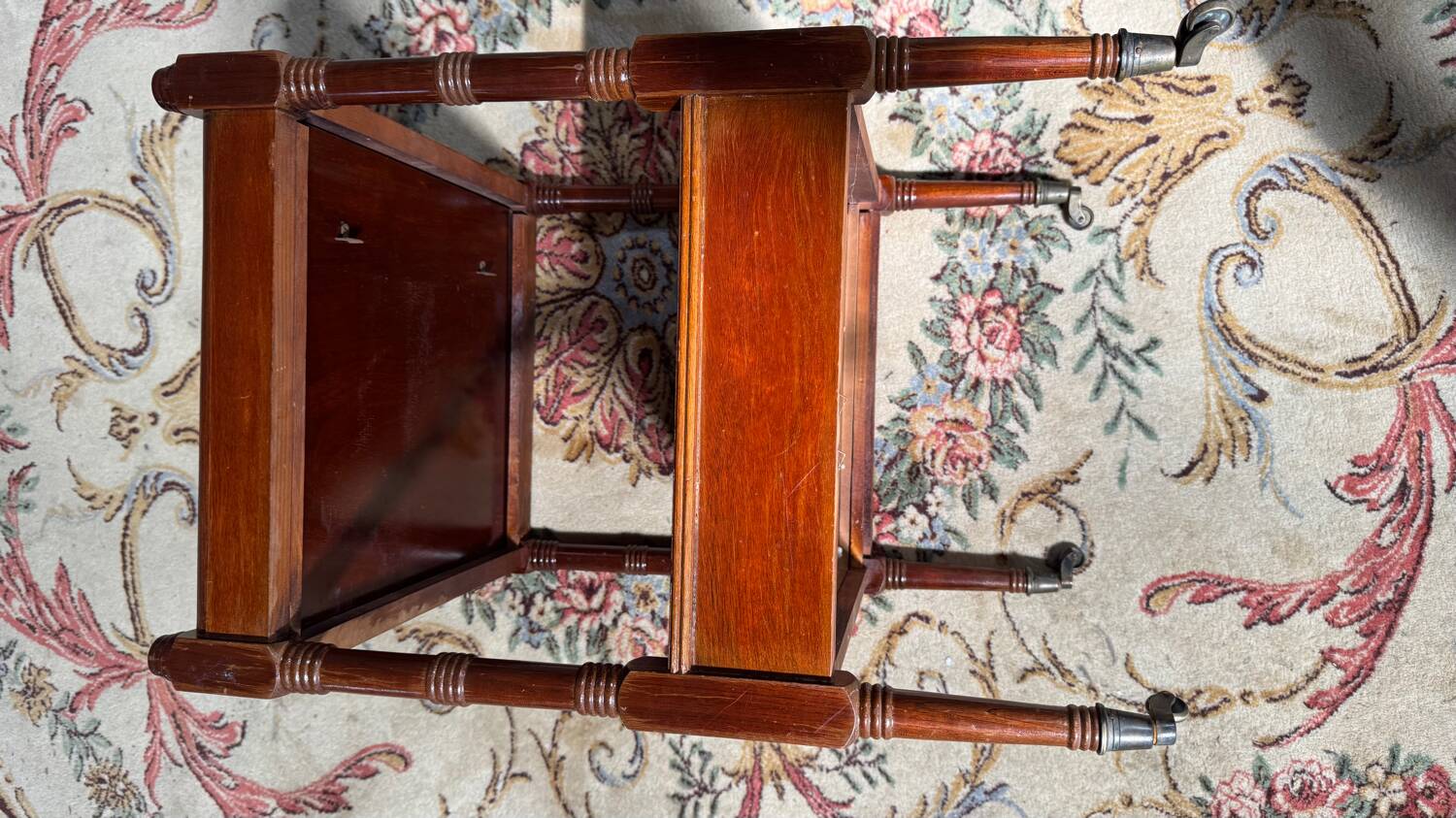 Antique mahogany rolling trolley