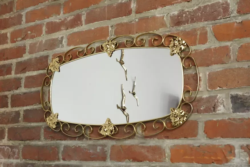 Miroir ovale années 50 en laiton - 38x69cm