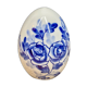 Decorative egg in white porcelain decoration blue flowers