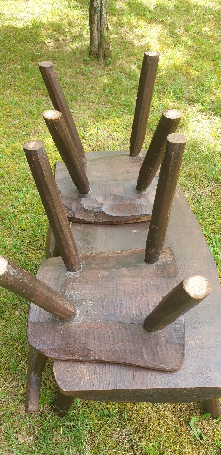 Four chairs and brutalist coffee table