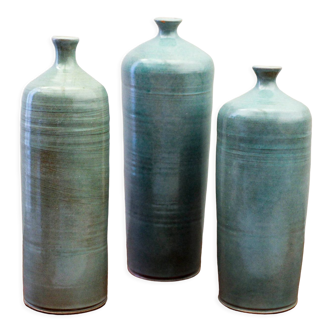 Trio of soliflores vases enamelled ceramic bottles