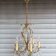 Remarkable 6-light cage chandelier with crystal pendants, complete and in working order.