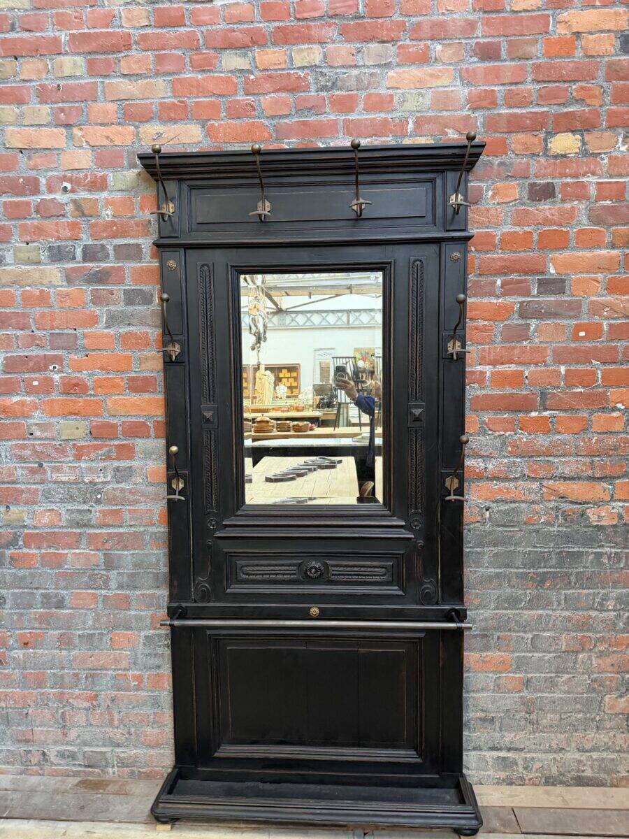 Patinated oak wardrobe from the early 20th century.