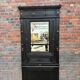 Patinated oak wardrobe from the early 20th century.