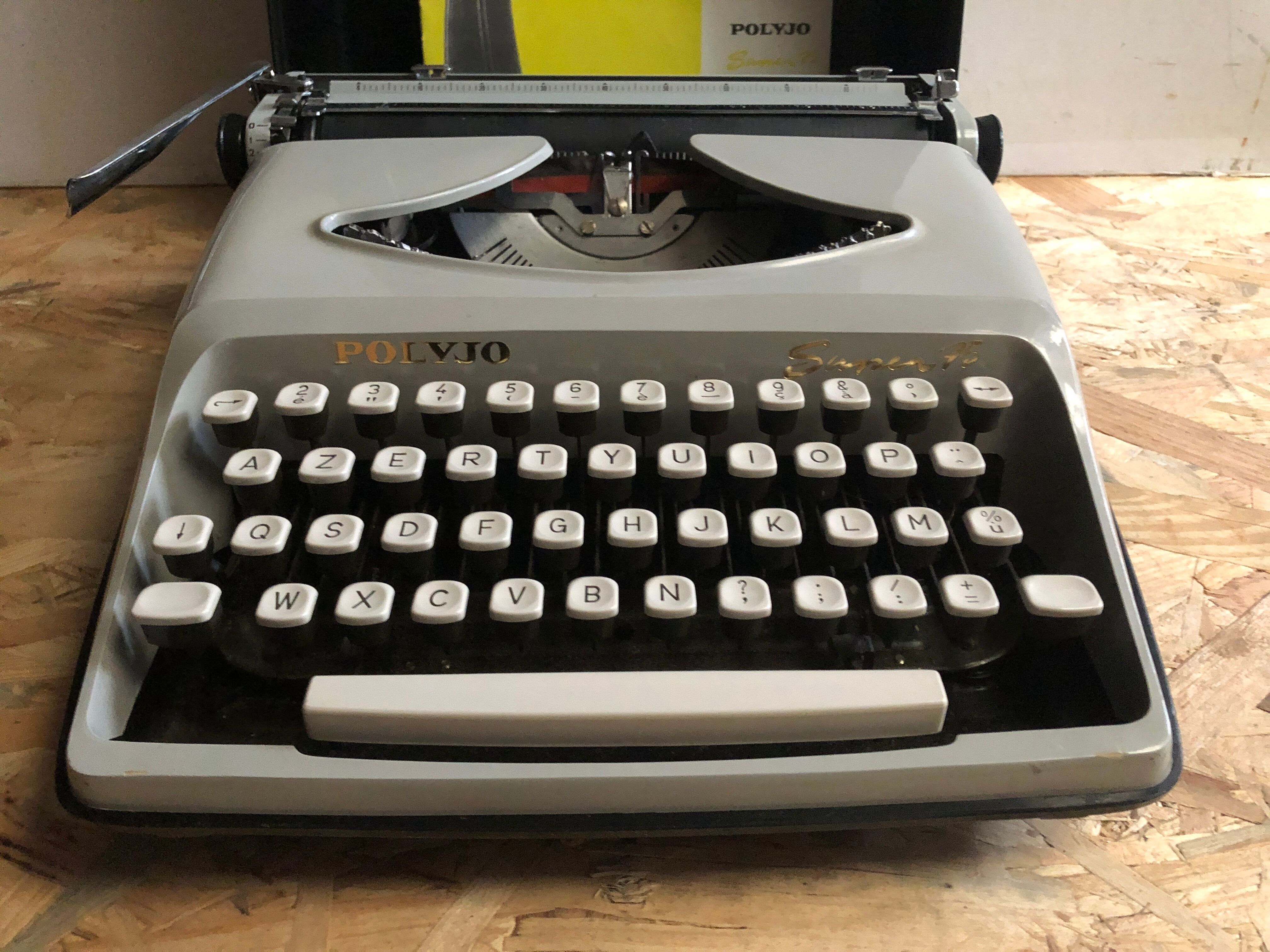 Old writing machine polyjo super 75 bakelite grey + vintage black trunk