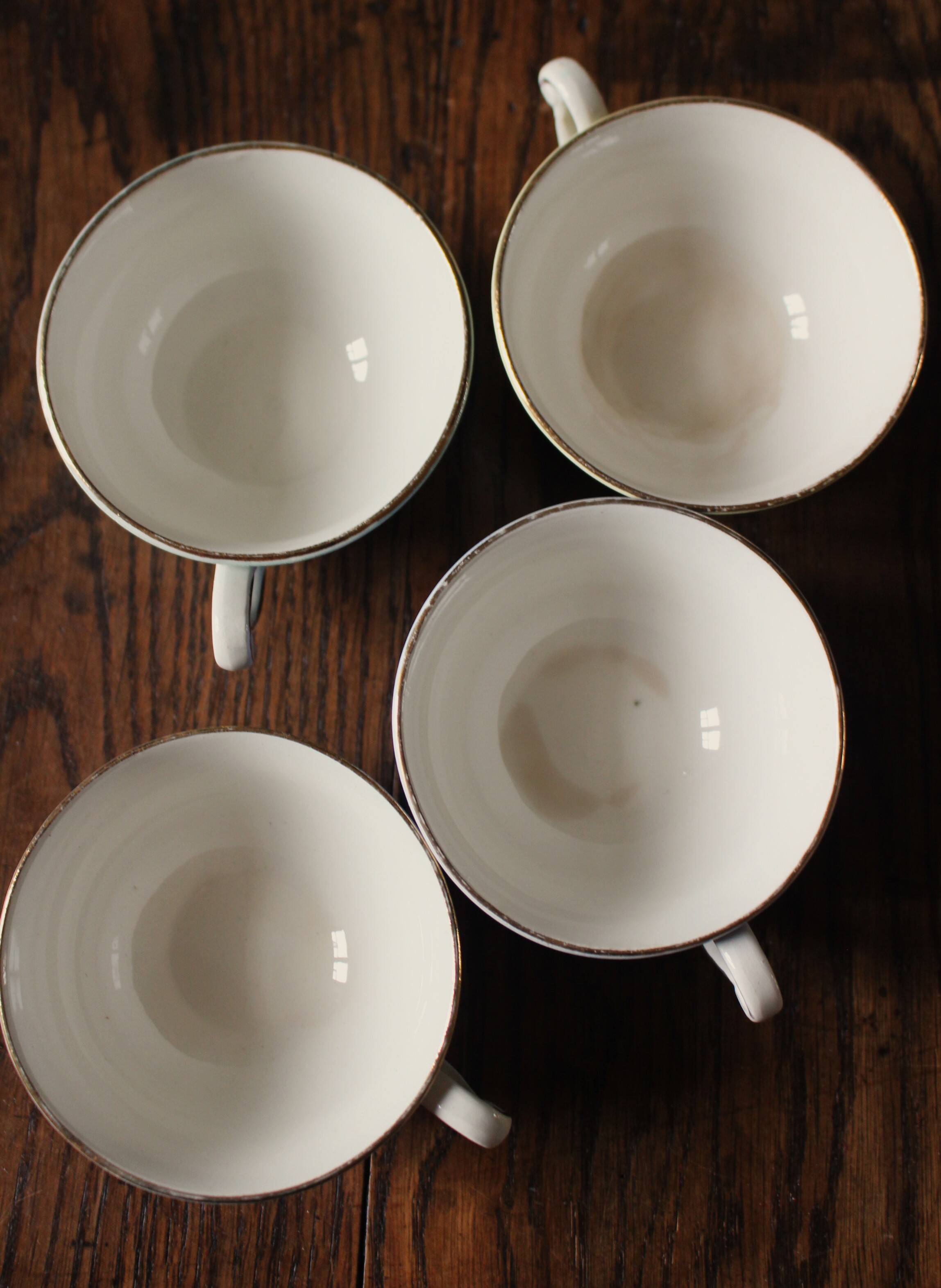 4 Céranord colored and gilded coffee cups