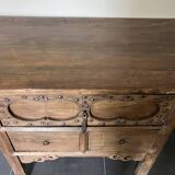 Very old elm wood with carved patterns and ironwork pieces.