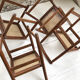 Lot de 4 chaises cannées années 50