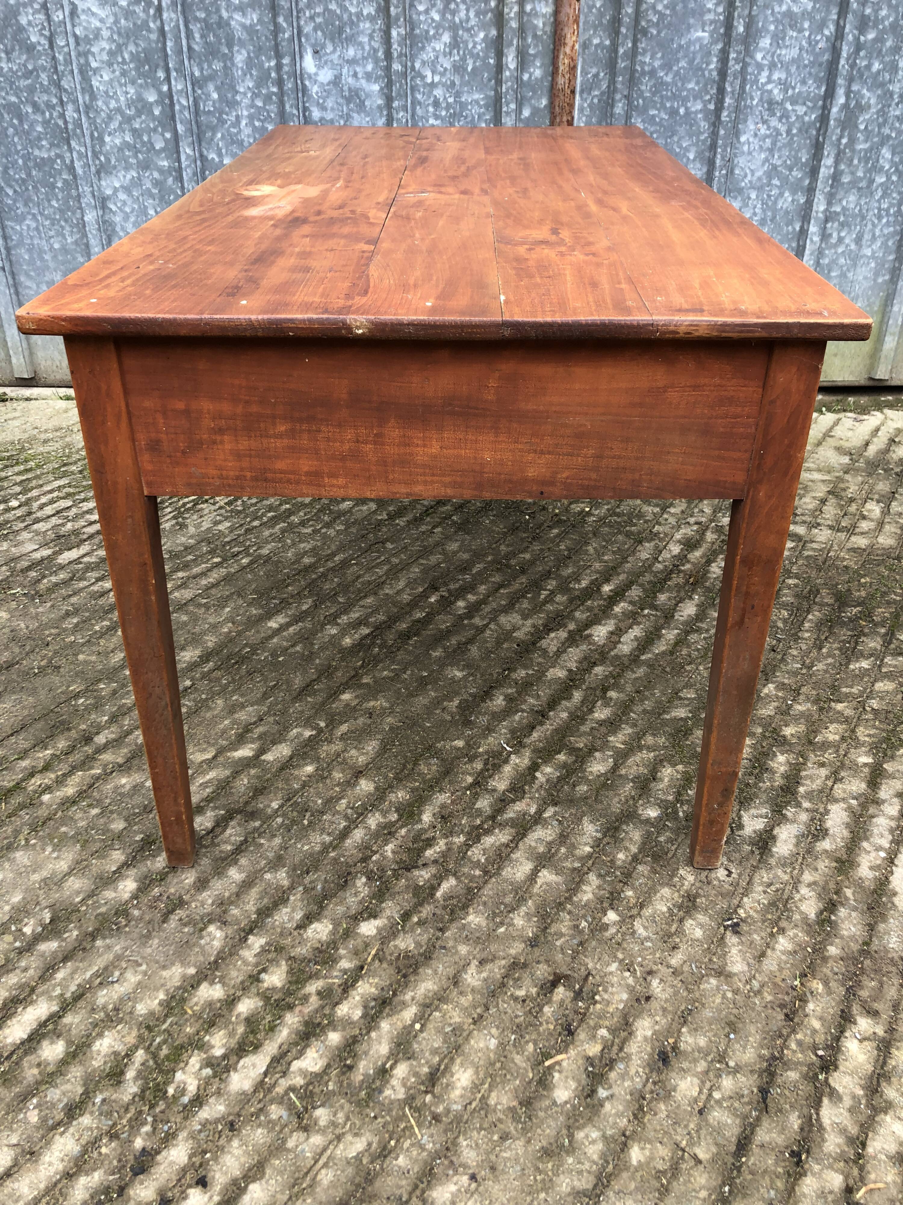 Poplar wood table with 2 front drawers from the Reconstruction period.