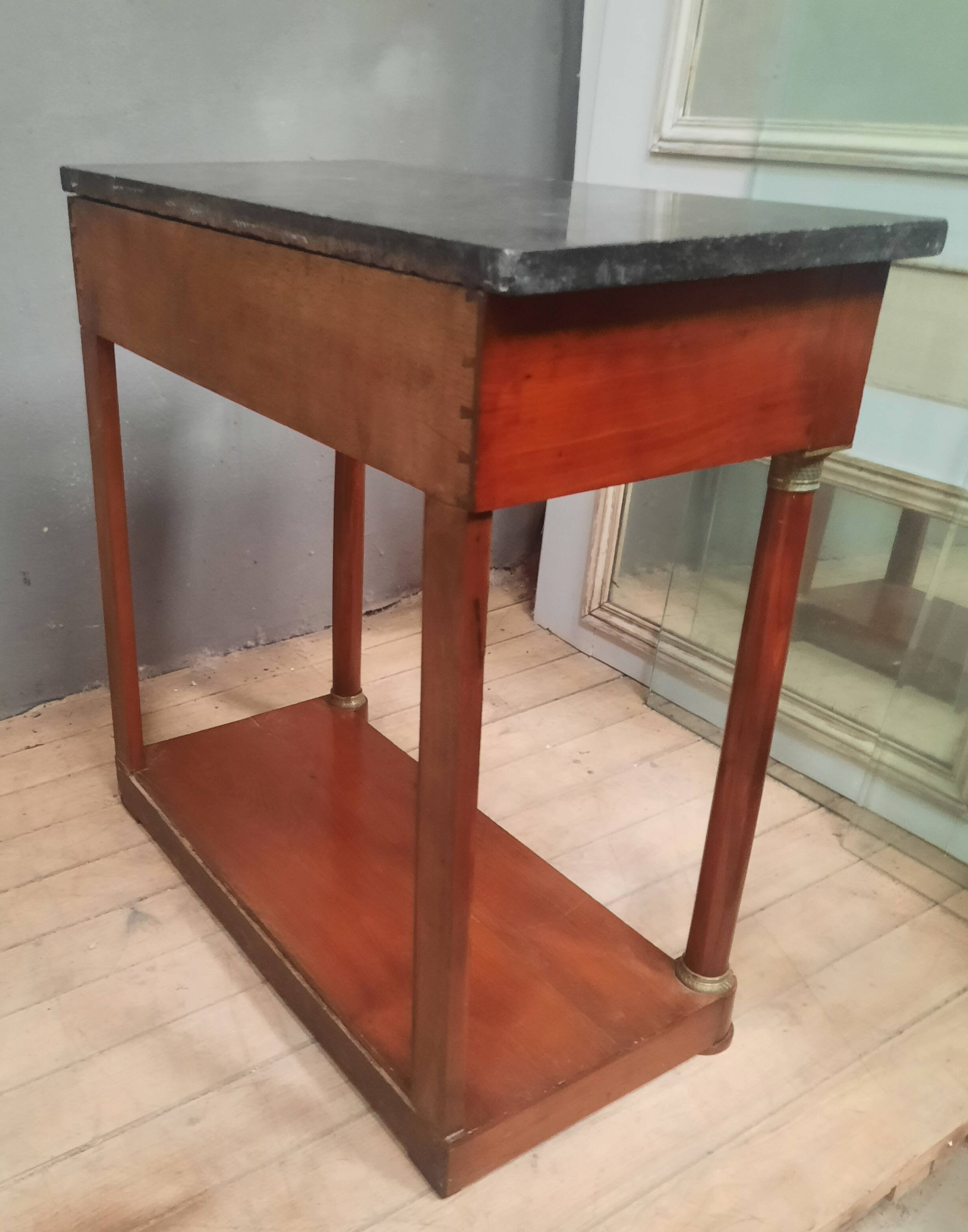 Empire period marble top console table