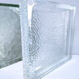 Two designer glass paving pockets