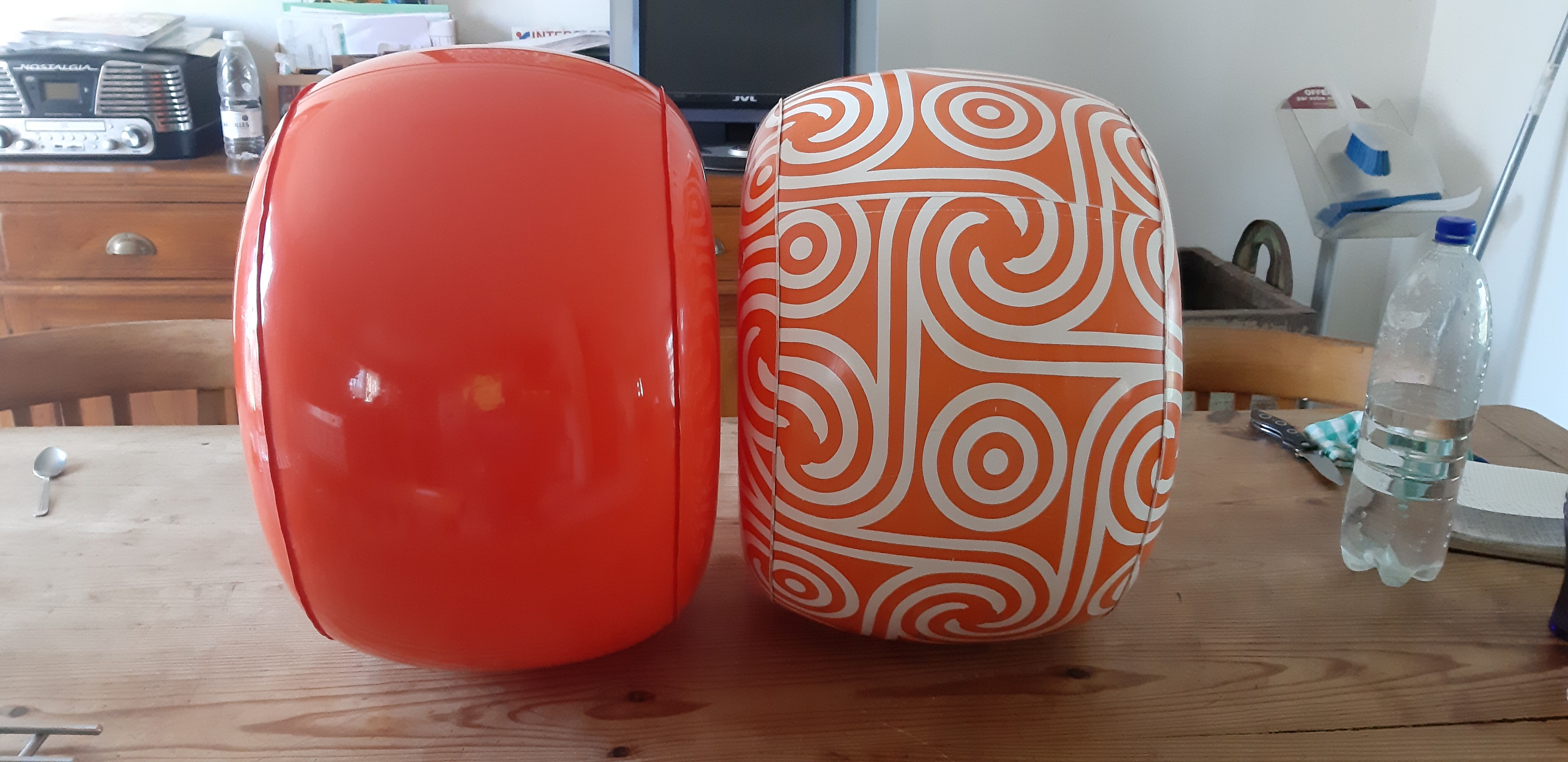 2 vintage inflatable poufs in orange plastic