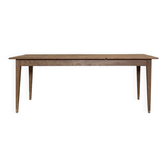 Vintage farm table with spindle legs.