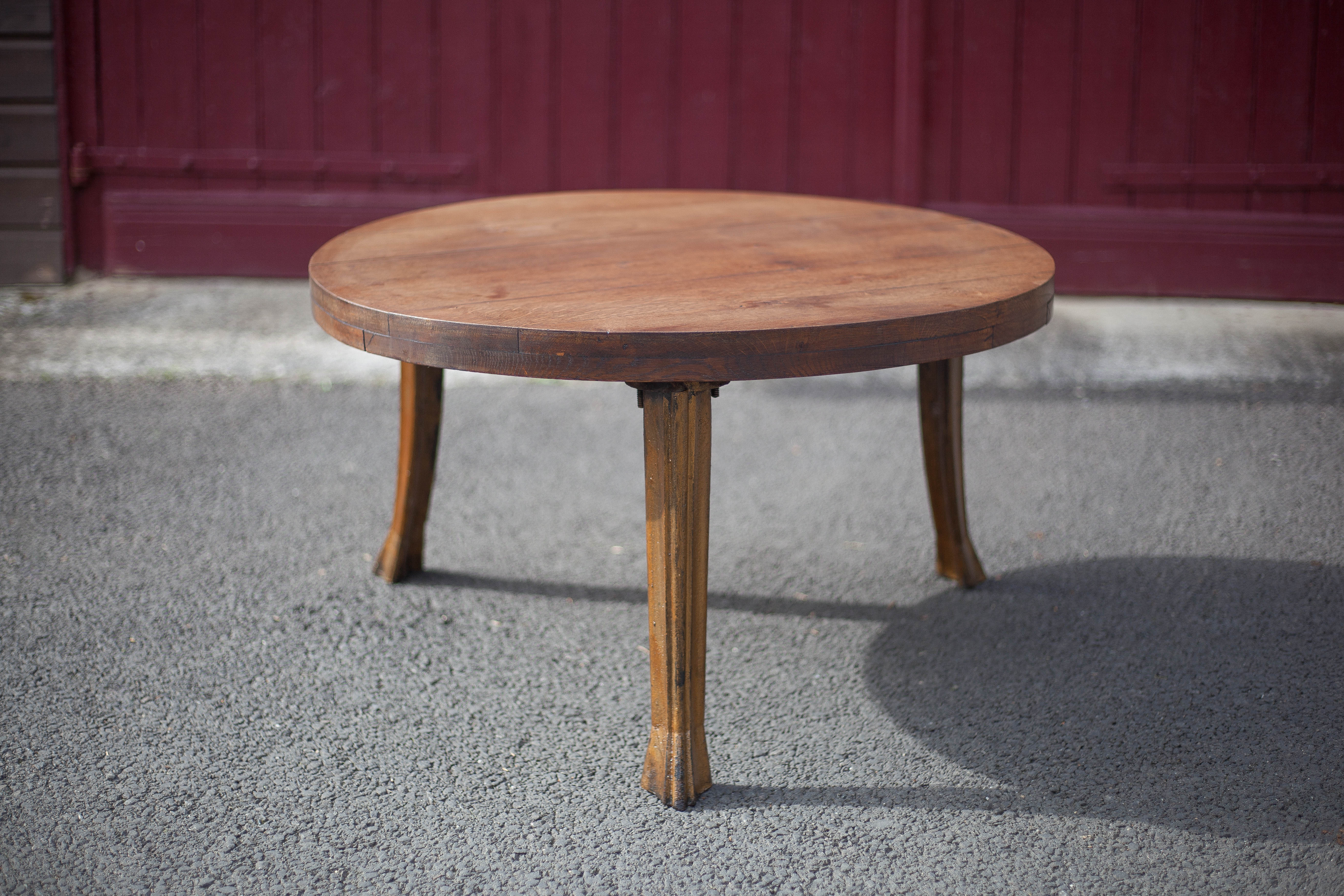 Wooden coffee table with cast iron legs
