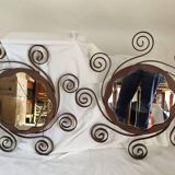 Pair of wrought iron sun mirrors