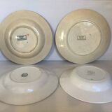 Four old earthenware plates