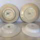 Four old earthenware plates