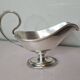 silver metal gravy boat