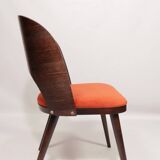 Scandinavian design orange papaya shell dining chairs