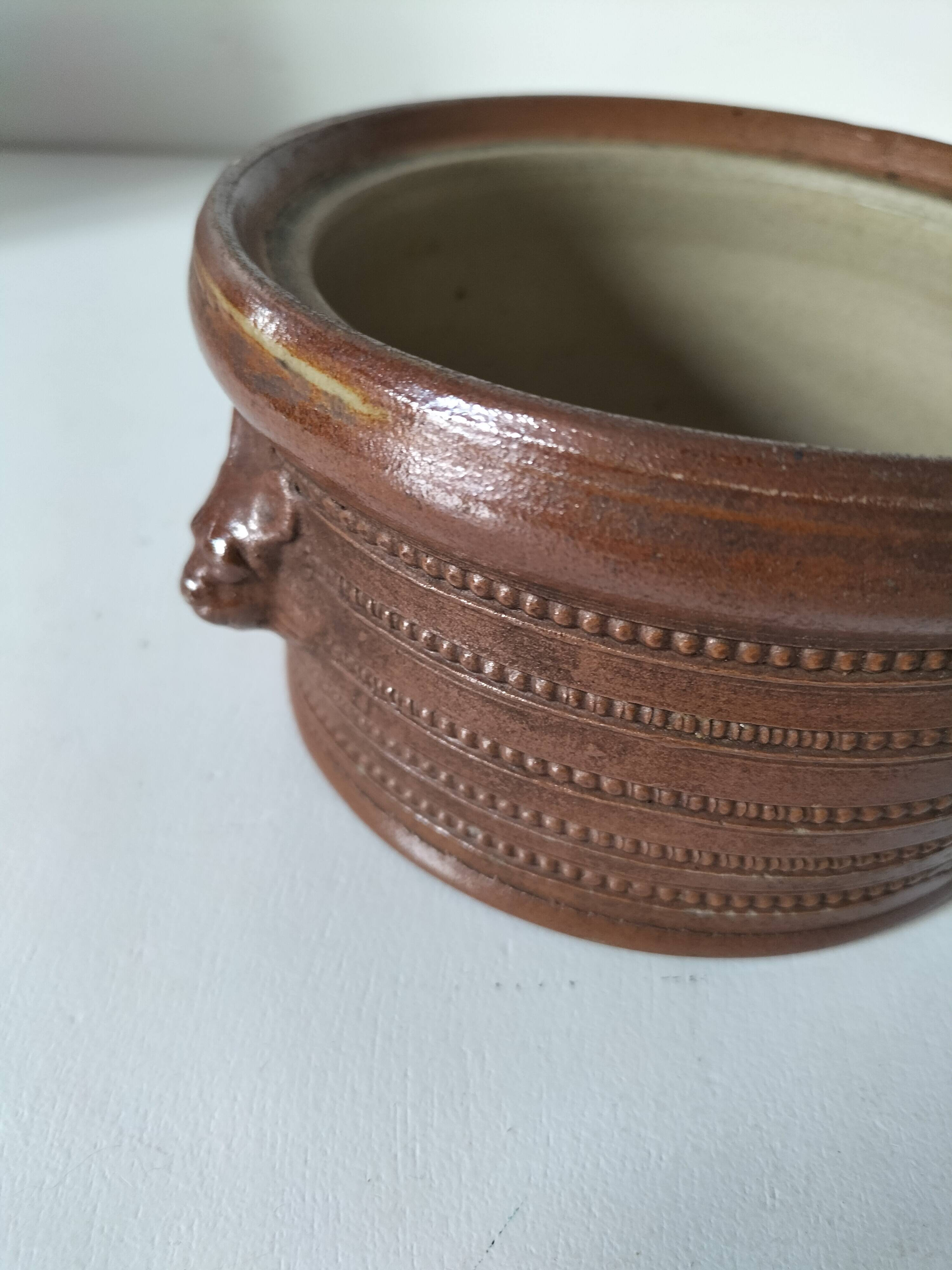 Stoneware pot Corneau Myennes decorated with hares
