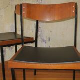 Pair of teak and iron stacking chairs, 1960s