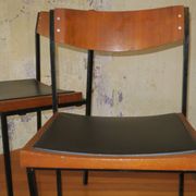 Pair of teak and iron stacking chairs, 1960s