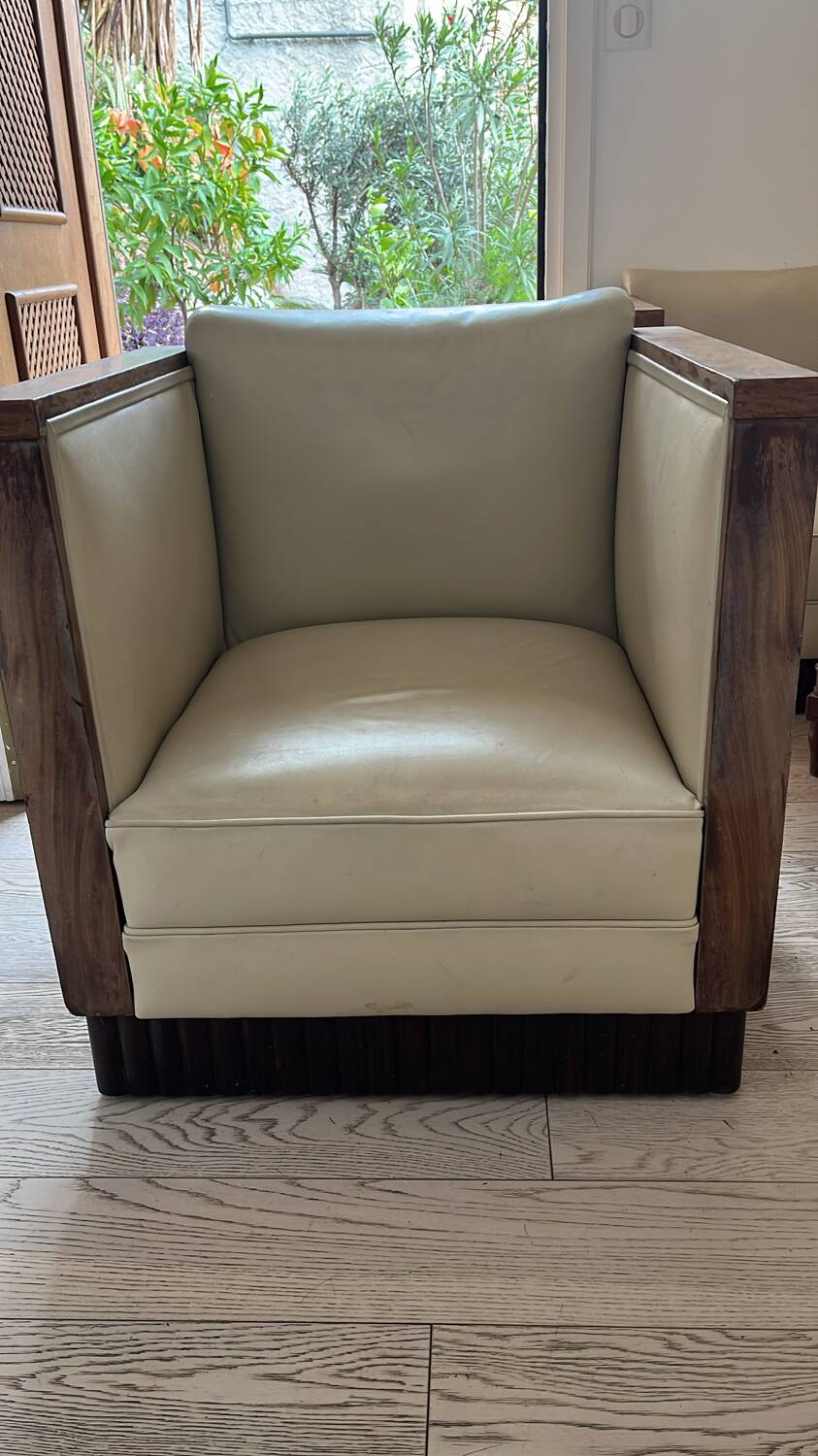 Two armchairs and an Art Deco style pouf