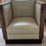 Two armchairs and an Art Deco style pouf