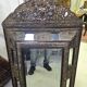 Antique mirror in repoussé and patinated copper from the Napoléon III era.