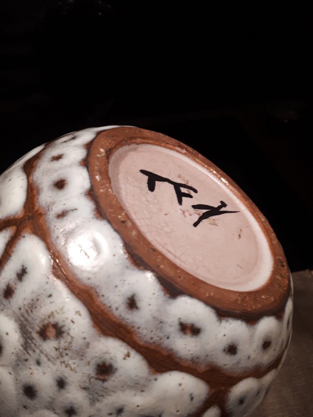 Long-necked vase from the 20s and 40s enamelled sandstone artist Tf's signature