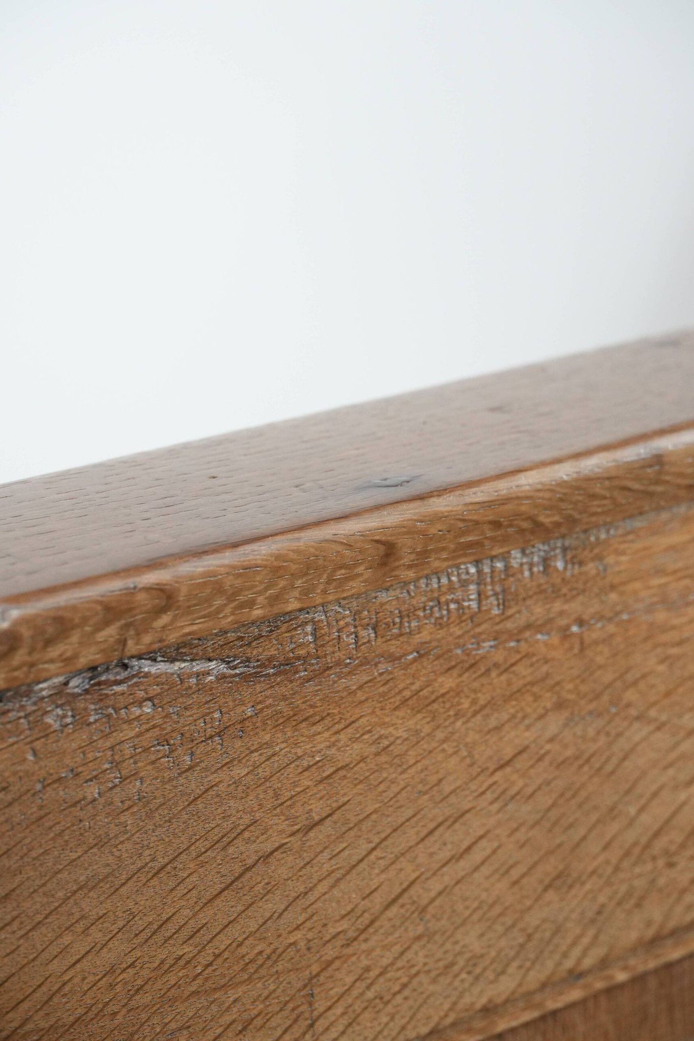 Antique oak church bench in Gothic style with beautiful wood carving