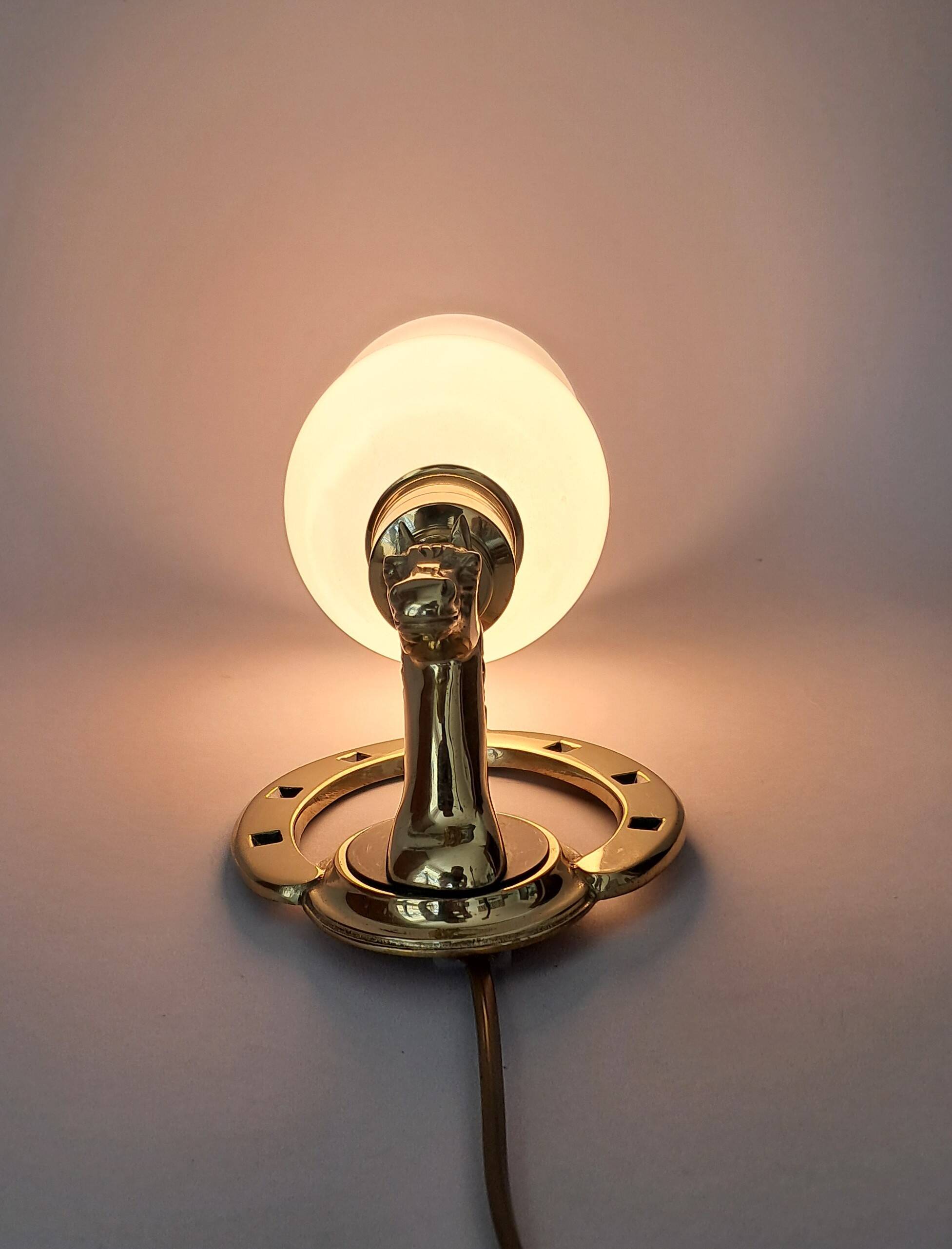 Gilded bronze wall lamp with iron and horse head 1950/1960.