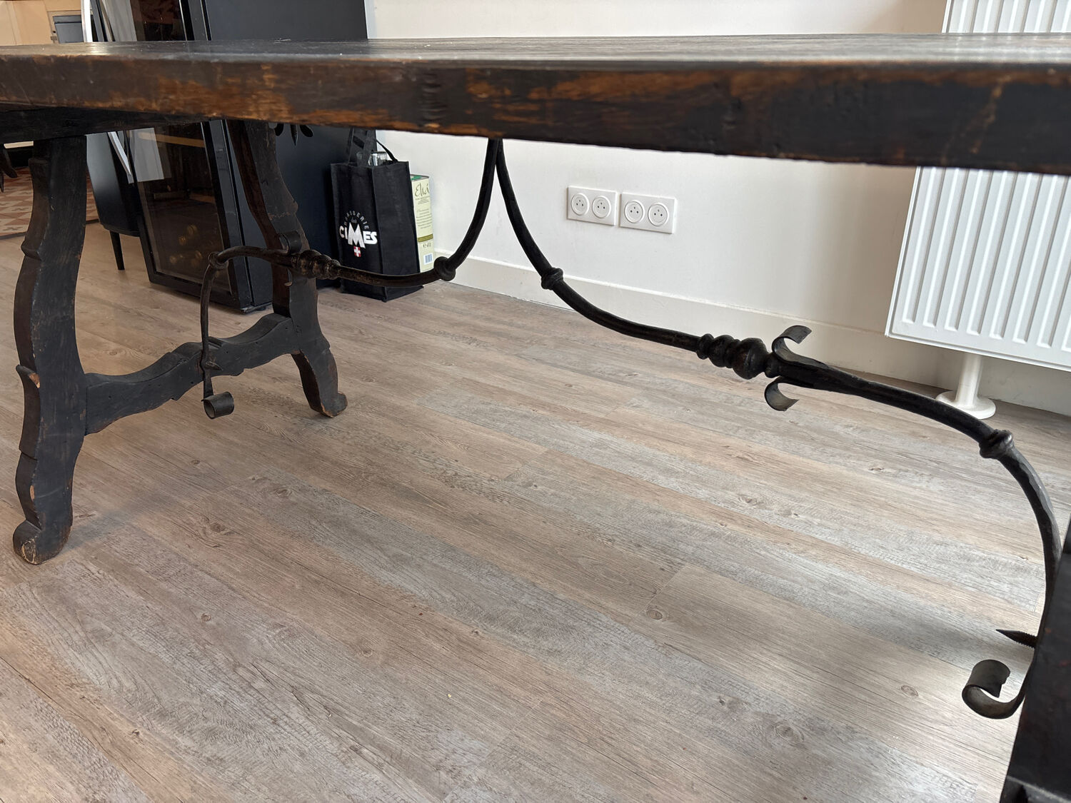 Solid wood farmhouse table with ebony finish.