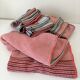 Tablecloth and 12 coral and grey napkins in a retro Scandinavian 1960s style.