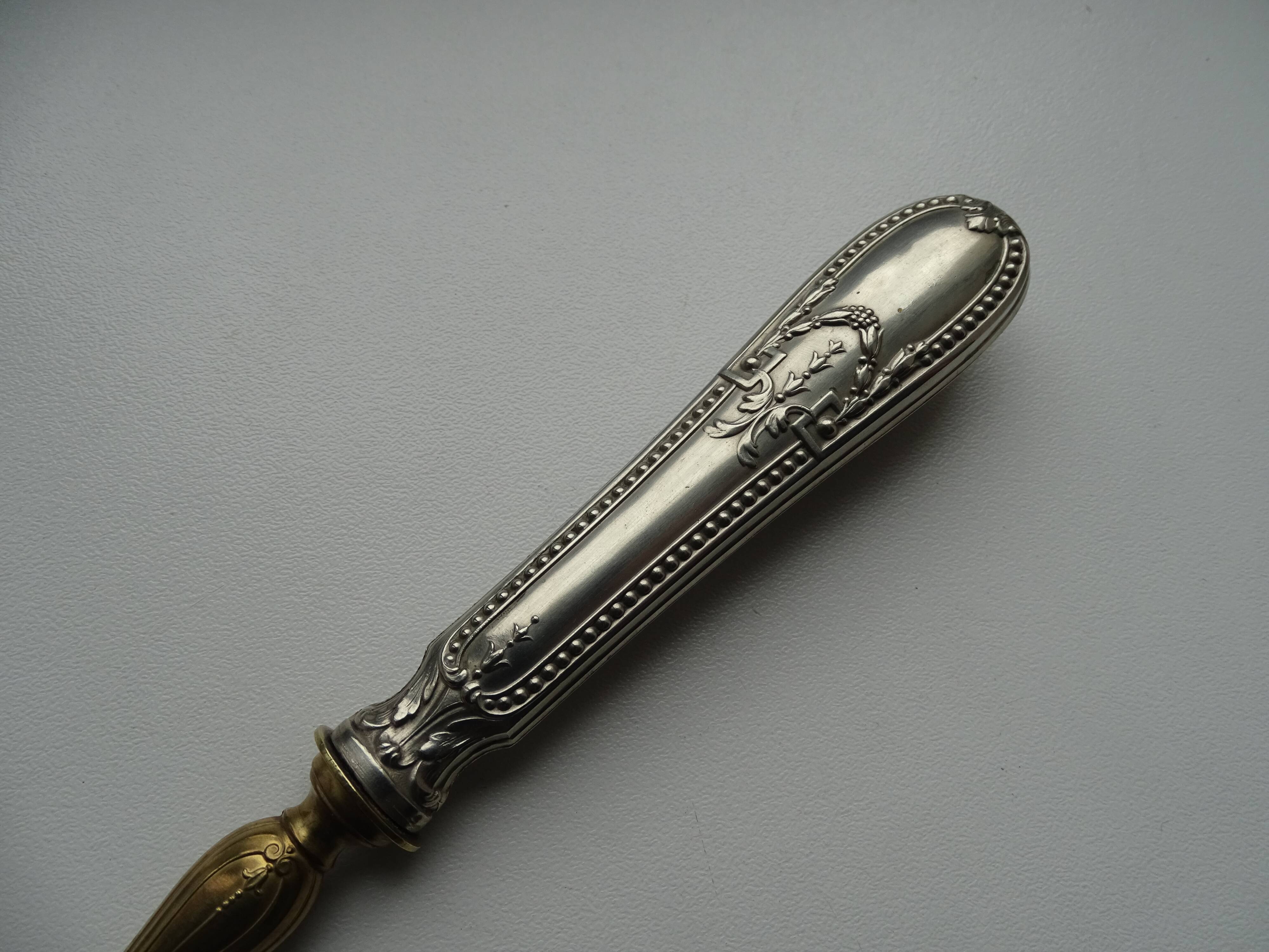 Openwork pie shovel with silver and gold metal hallmarked