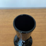 Artisanal vase in black glass with copper and blue inclusions.