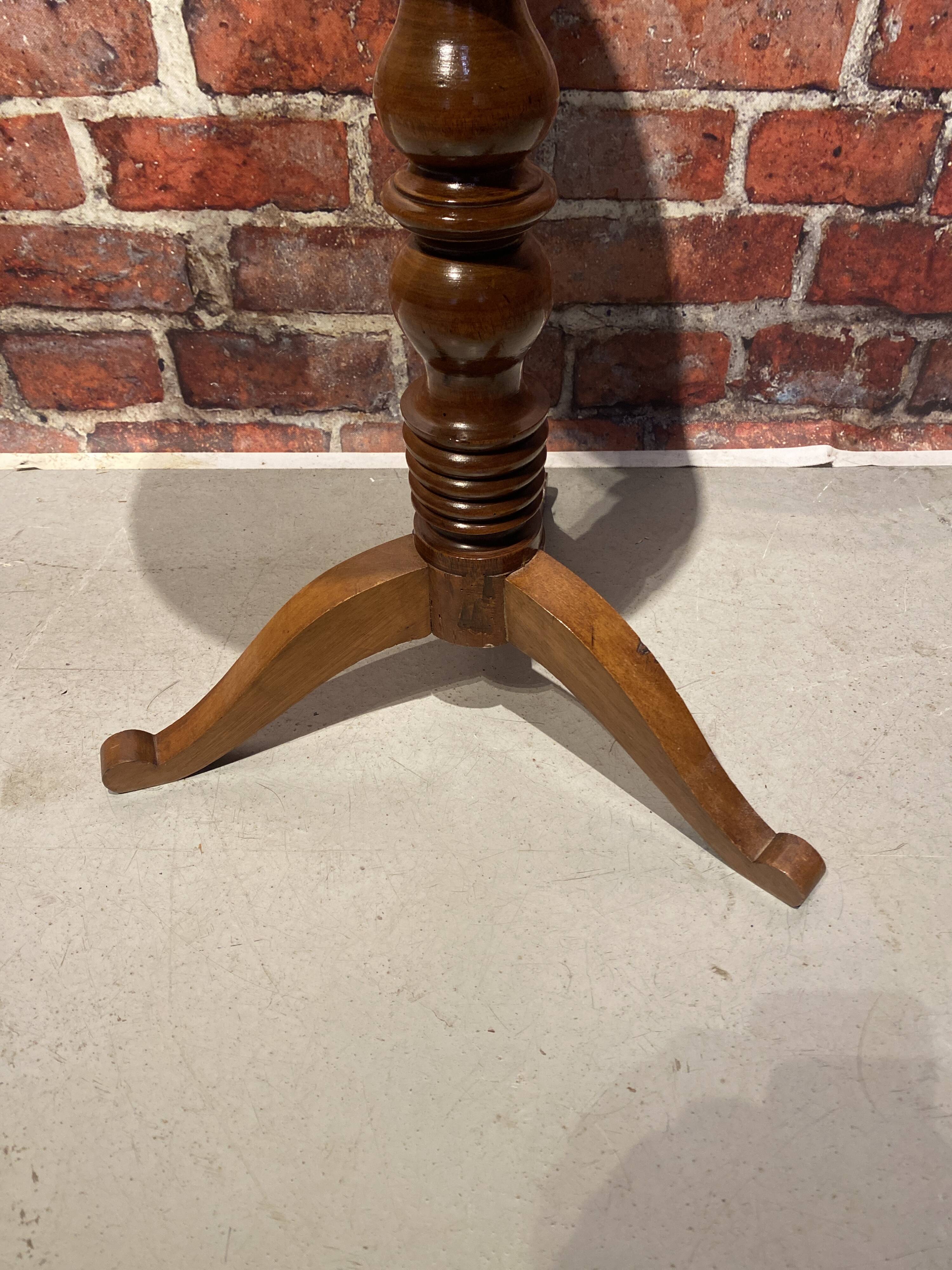 Wooden pedestal table