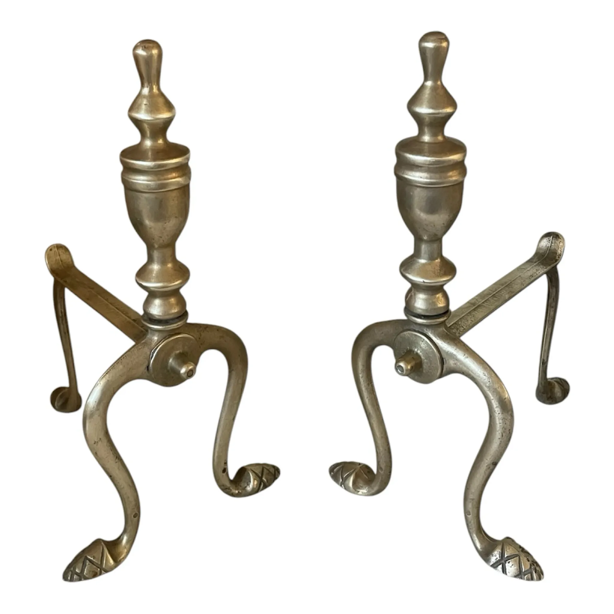 Pair of Victorian brass fire dogs from the late 19th century.