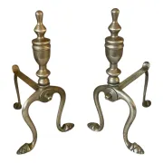 Pair of Victorian brass fire dogs from the late 19th century.